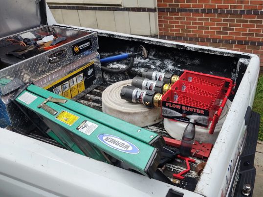 Plumbing equipment in pickup truck bed